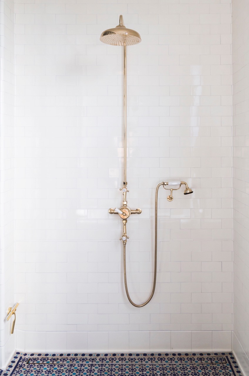 white subway tile on shower wall